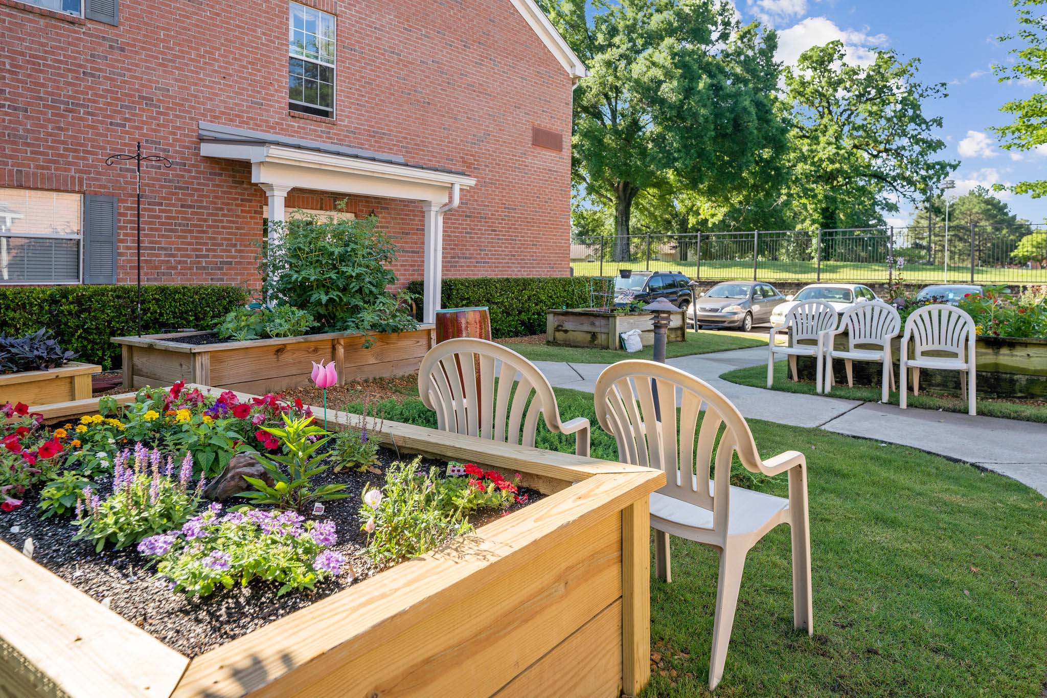 Exterior image of the Town Village Audubon Park's community garden boxes.