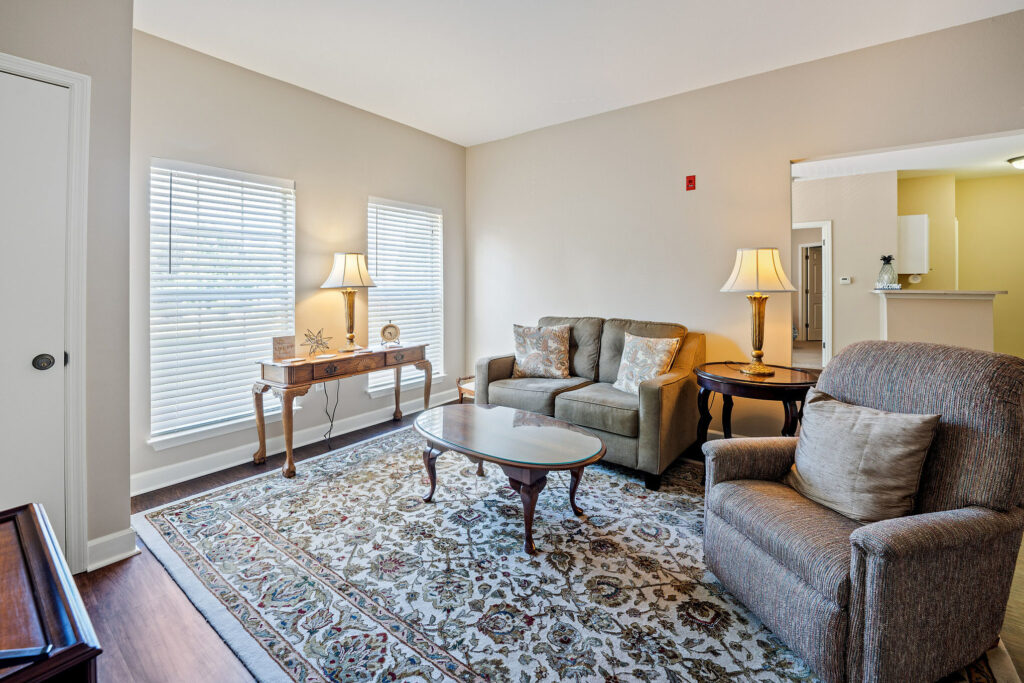 Interior image of a resident's apartment living room at Town Village Audubon Park.