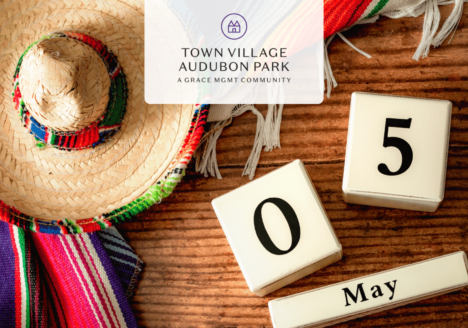 Promotional image for Town Village Audubon Park with a straw hat, colorful textiles, and calendar blocks reading 05 May on a wooden surface, logo centered.
